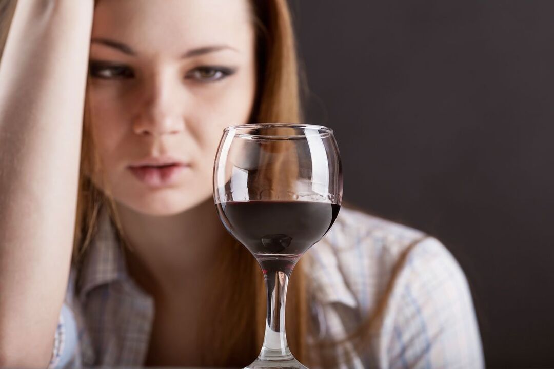 A woman addicted to alcohol