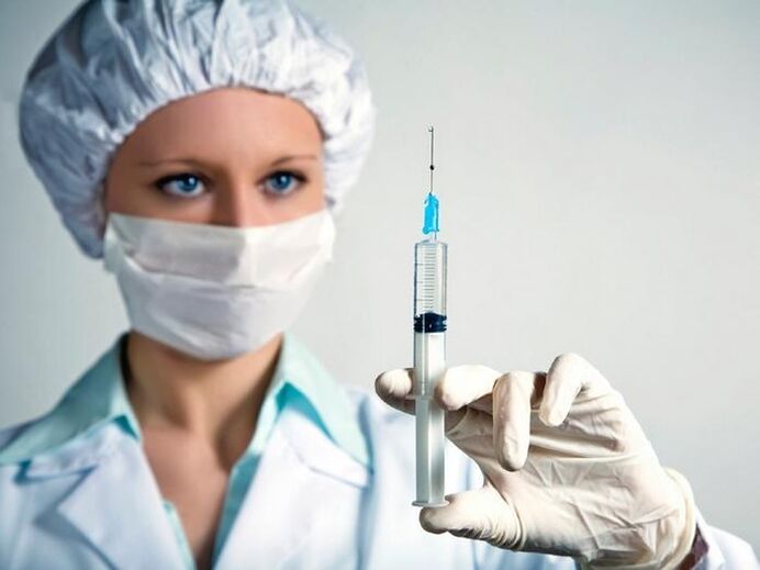 vaccine syringe and drinking alcohol